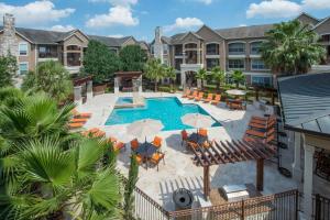 Apartments for rent in Southwest Houston, TX - Aerial of Apartments Pool and Surrounding Area
