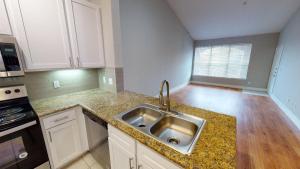 Two Bedroom Apartments In Westchase Southwest Houston, TX - Apartment Kitchen with View to Living and Dining Rooms
