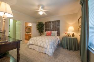 One Bedroom Apartments in SW Houston, Texas - Classic Model Bedroom with View to Bathroom and Closet