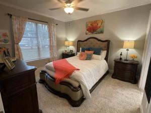 One Bedroom Apartments in Southwest Houston, TX - Model Bedroom with Large Window